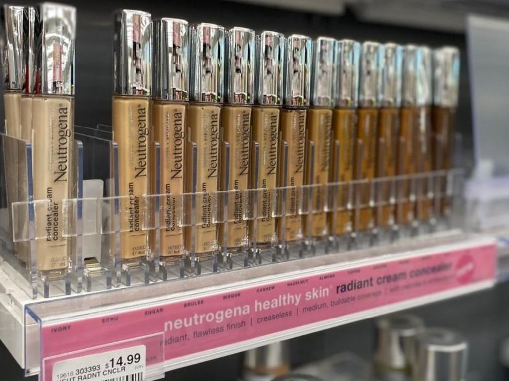 concealer sticks on shelf at store