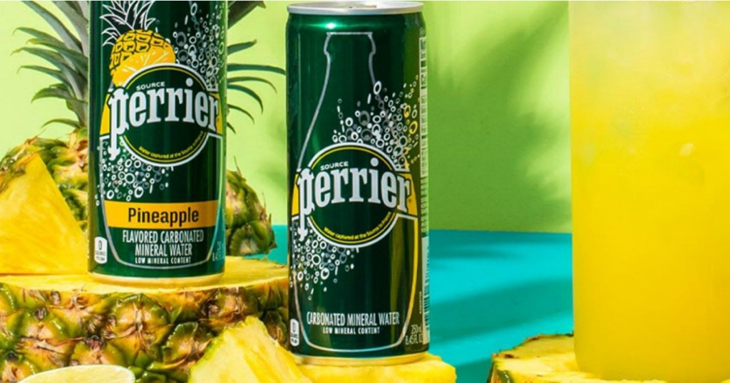 Perrier Mineral Water on table next to pineapple