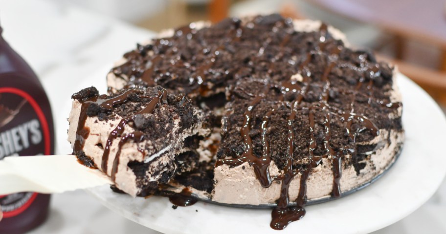 cutting through an oreo icebox cake