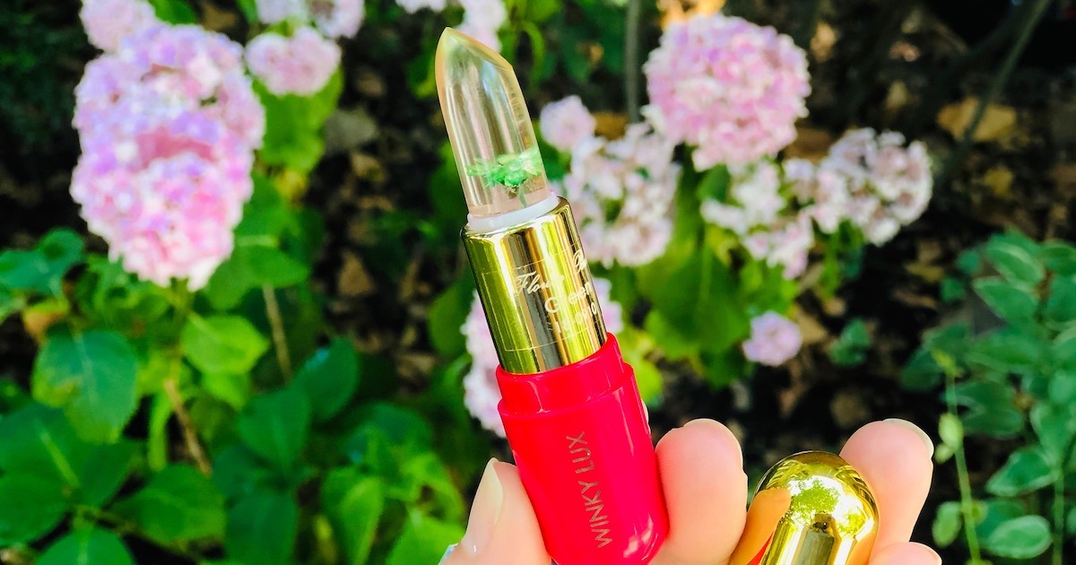 lip stick with green flower inside