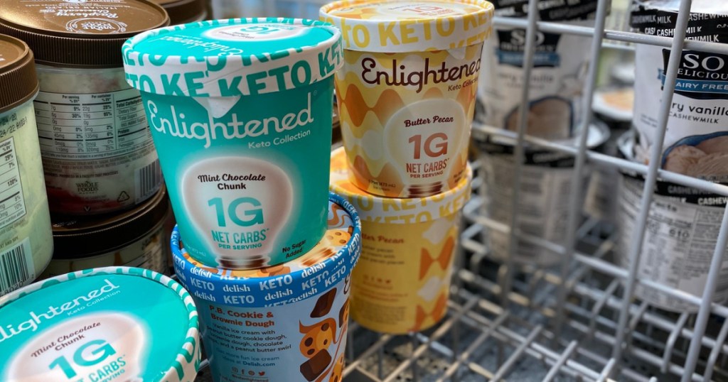 pints of ice cream stacked on each other in freezer