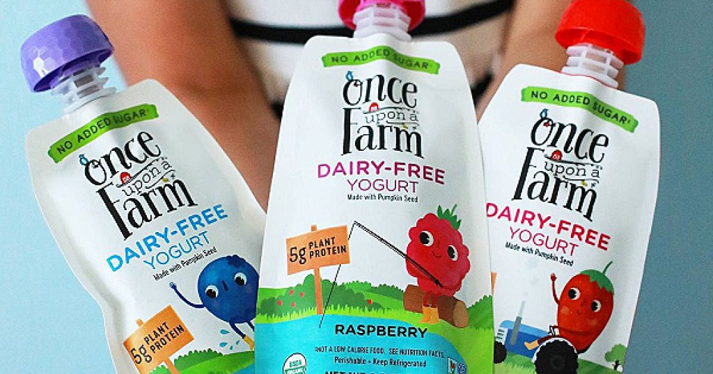 kid holding Once Upon a Farm Dairy-Free Yogurts