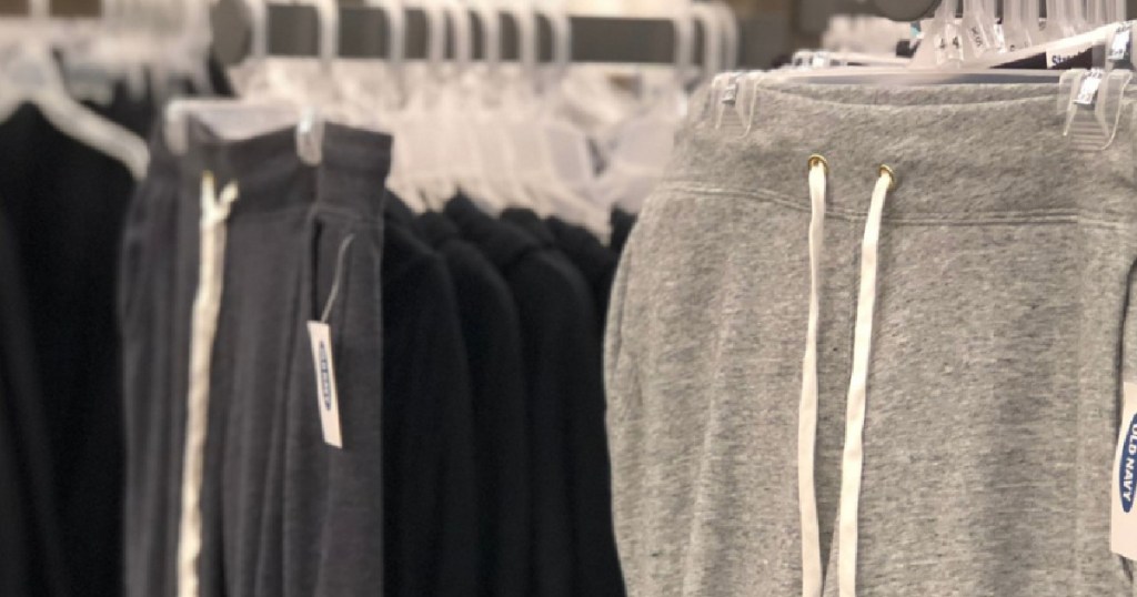 old navy fleece joggers hanging in store