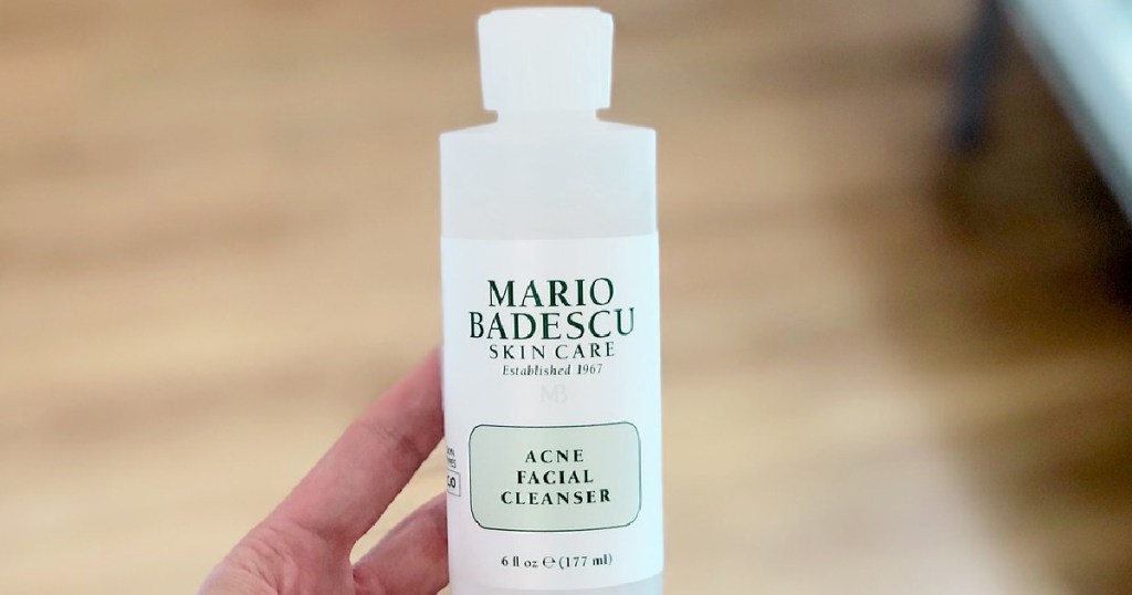 person holding a Mario Badescu Acne Facial Cleanser, 6-oz