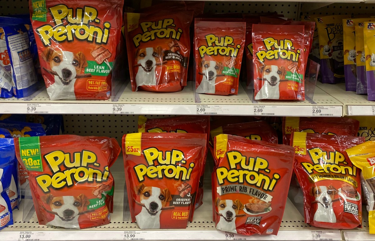 bags of dog treats on a store shelf