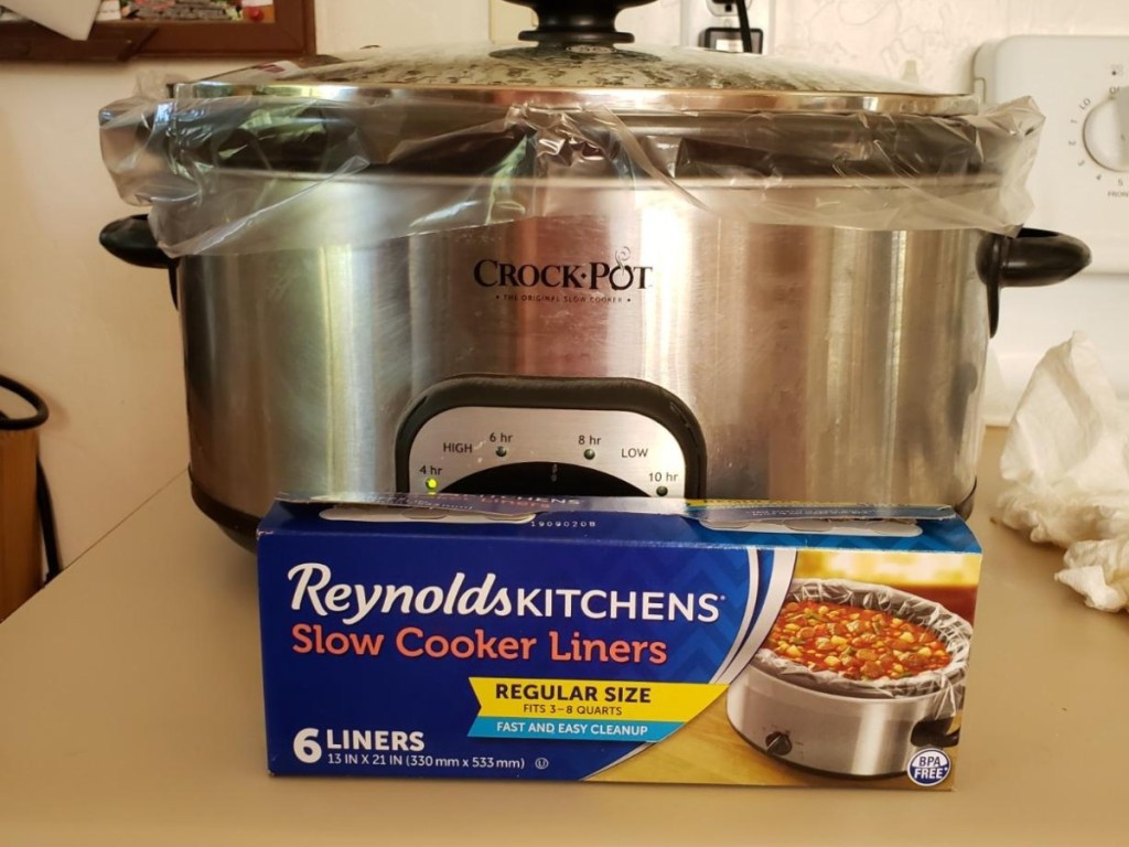 box of slow cooker liners in front of slow cooker