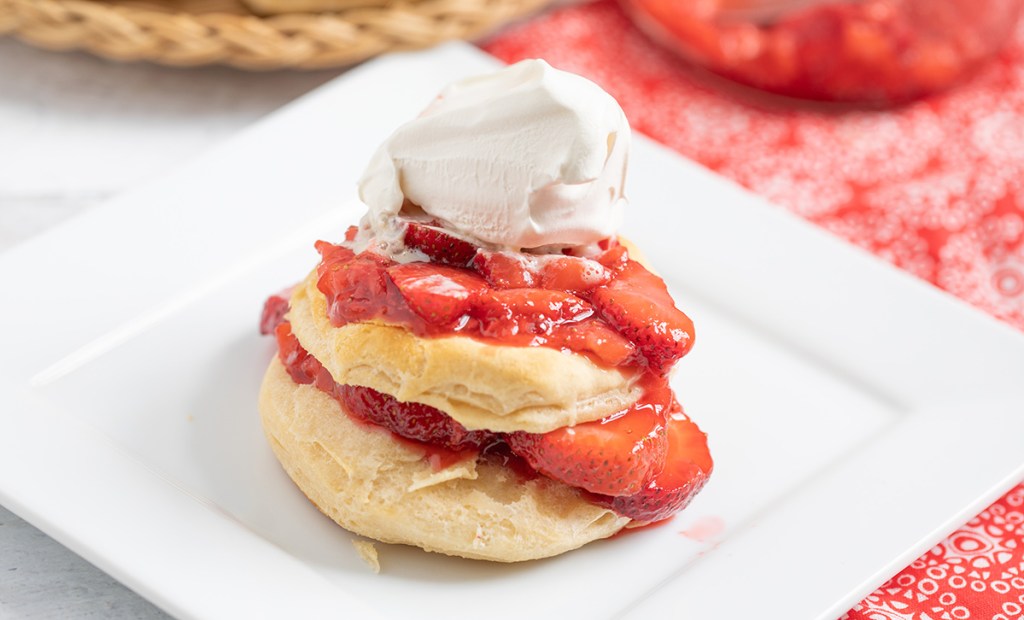 strawberry shortcake with whipped cream on top