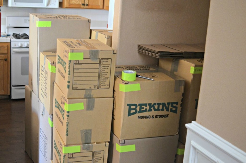 moving boxes stacked in kitchen