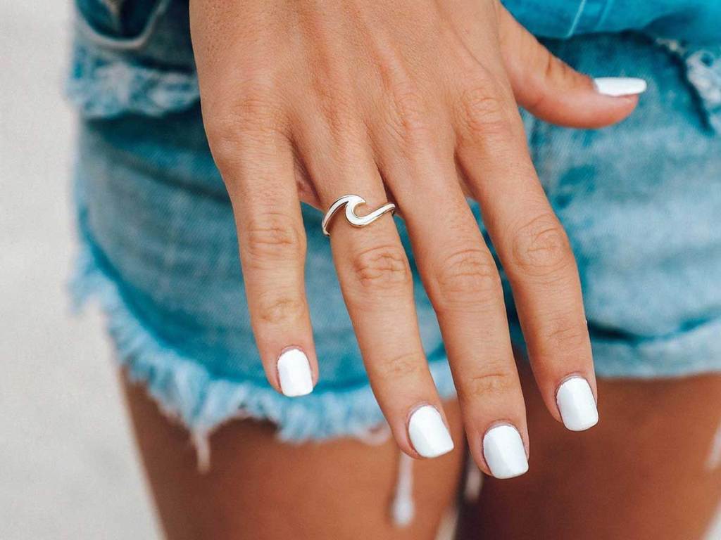 model wearing wave ring on finger