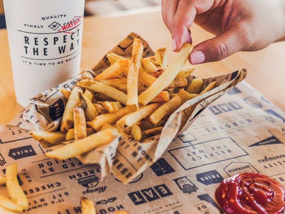 eating fries from Wayback Burgers