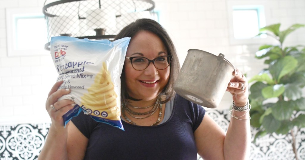 woman holding a bag of pineapple dole whip mix