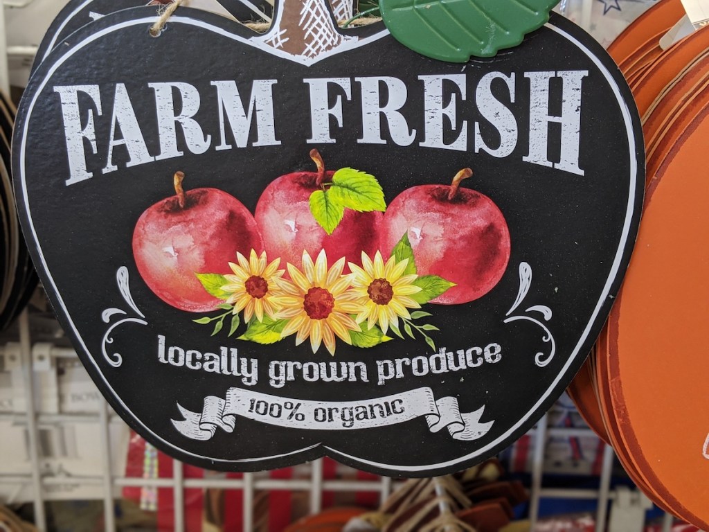 black wooden farm fresh sign with apples on it