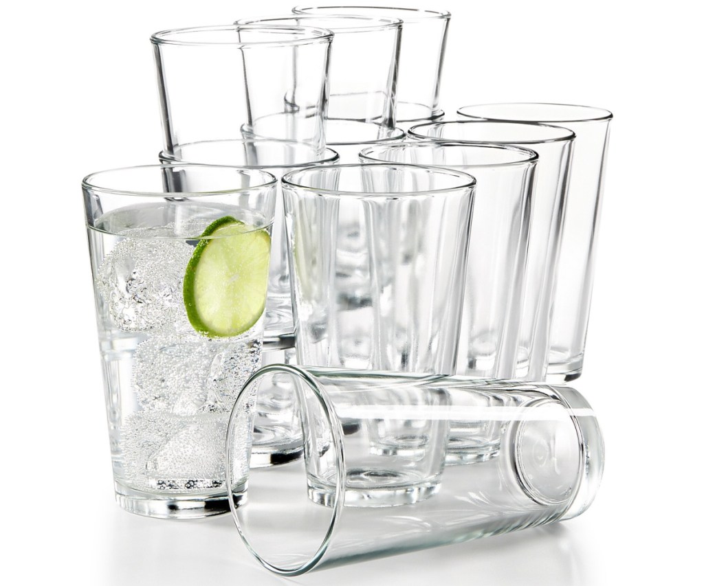 twelve large tumblers, one filled with water and lime