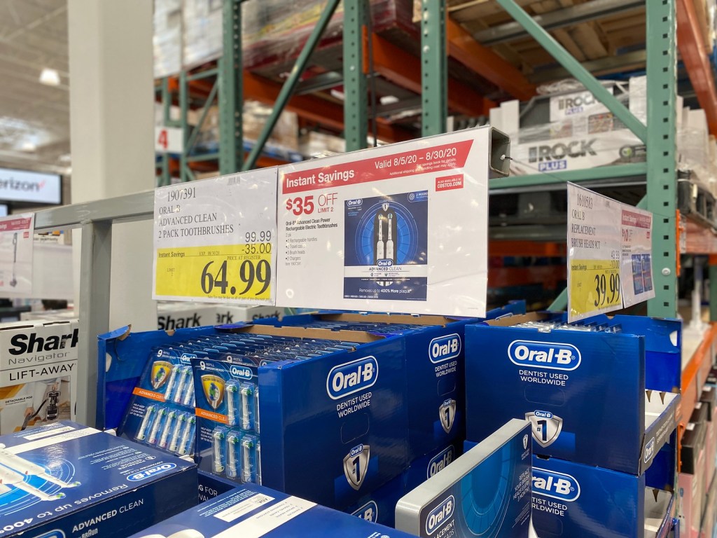 Costco sign showing sale price of toothbrushes