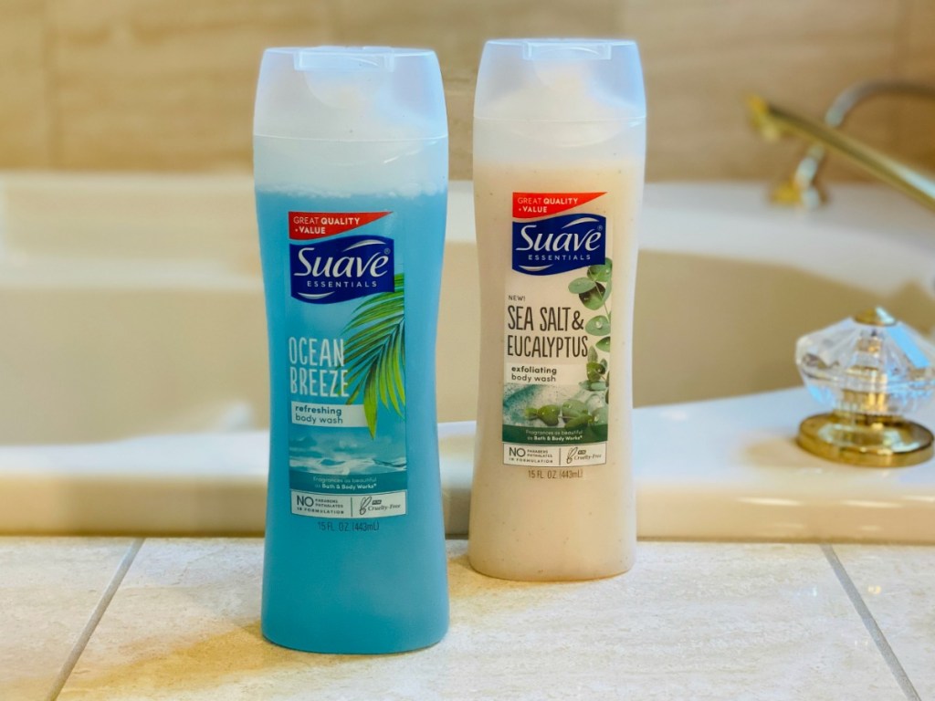 Suave Body wash bottles on bathtub shelf