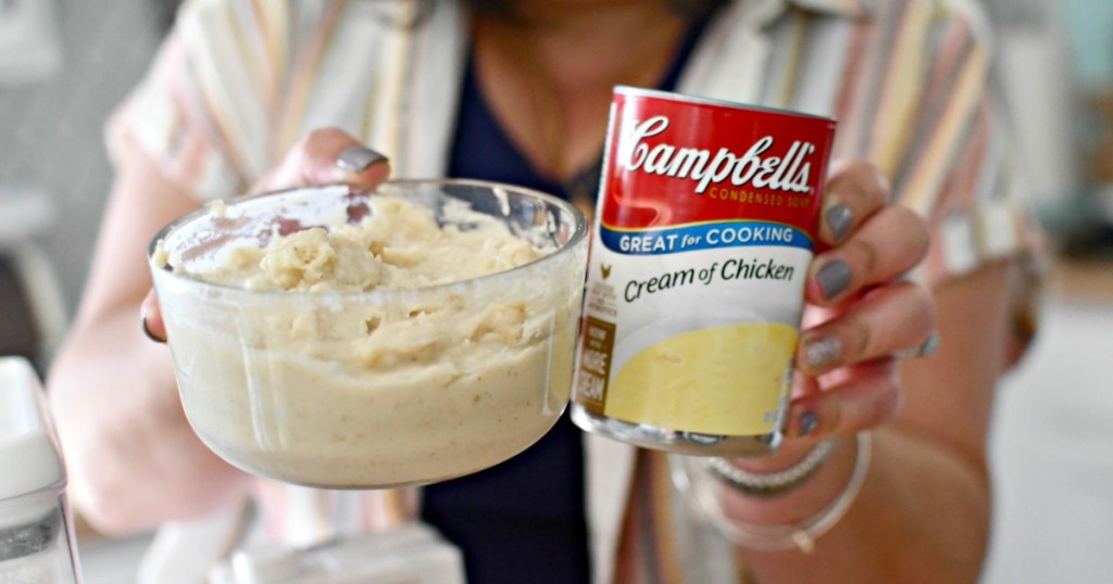 woman holding cream of chicken substitute