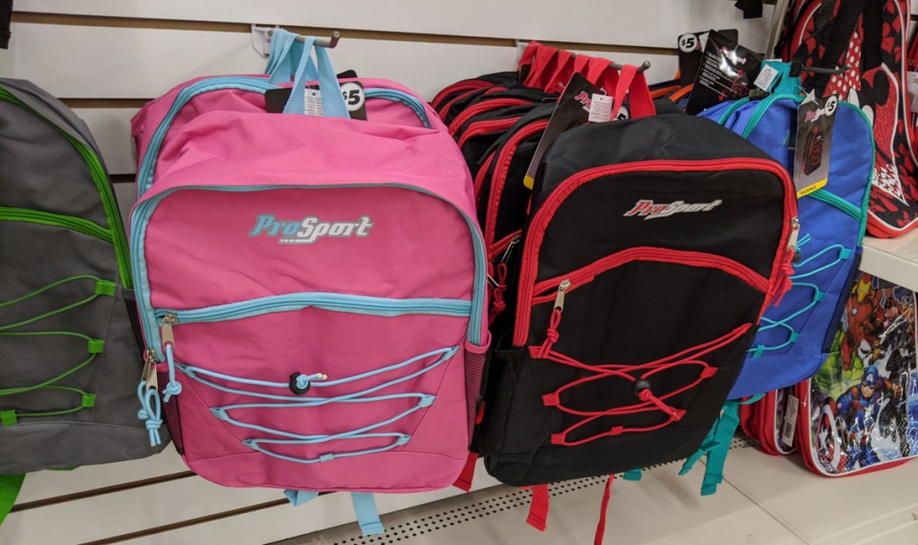 prosport pink and black backpacks hanging in store