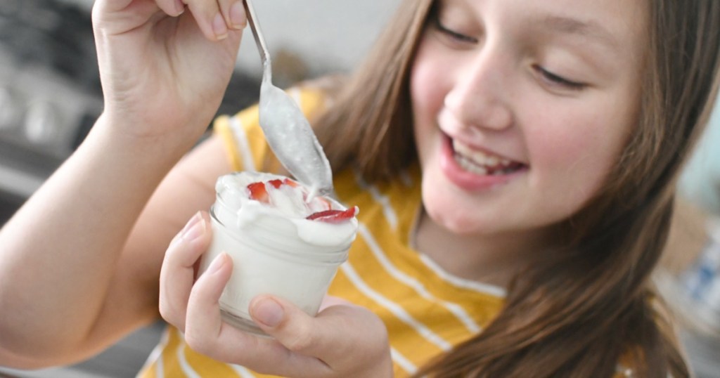 strawberries and yogurt in a cup