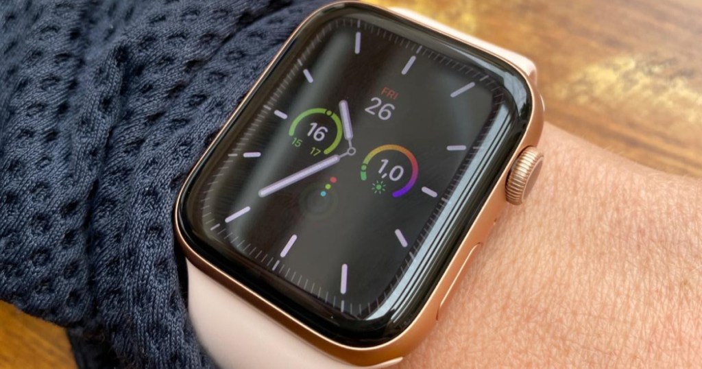 pink and gold Apple Watch on wrist