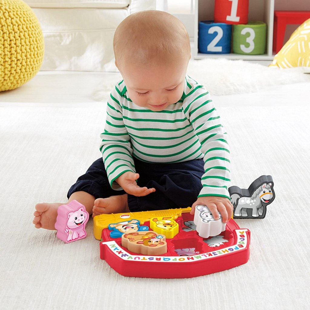 Baby Playing with Farm Puzzle