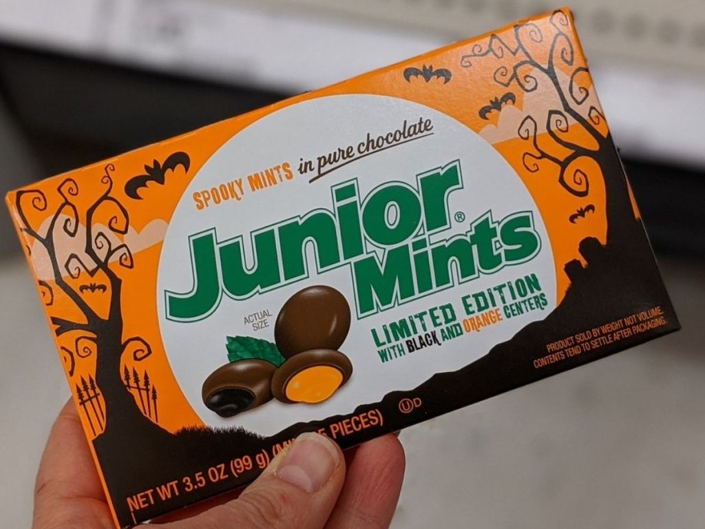 hand holding box of Halloween Junior Mints