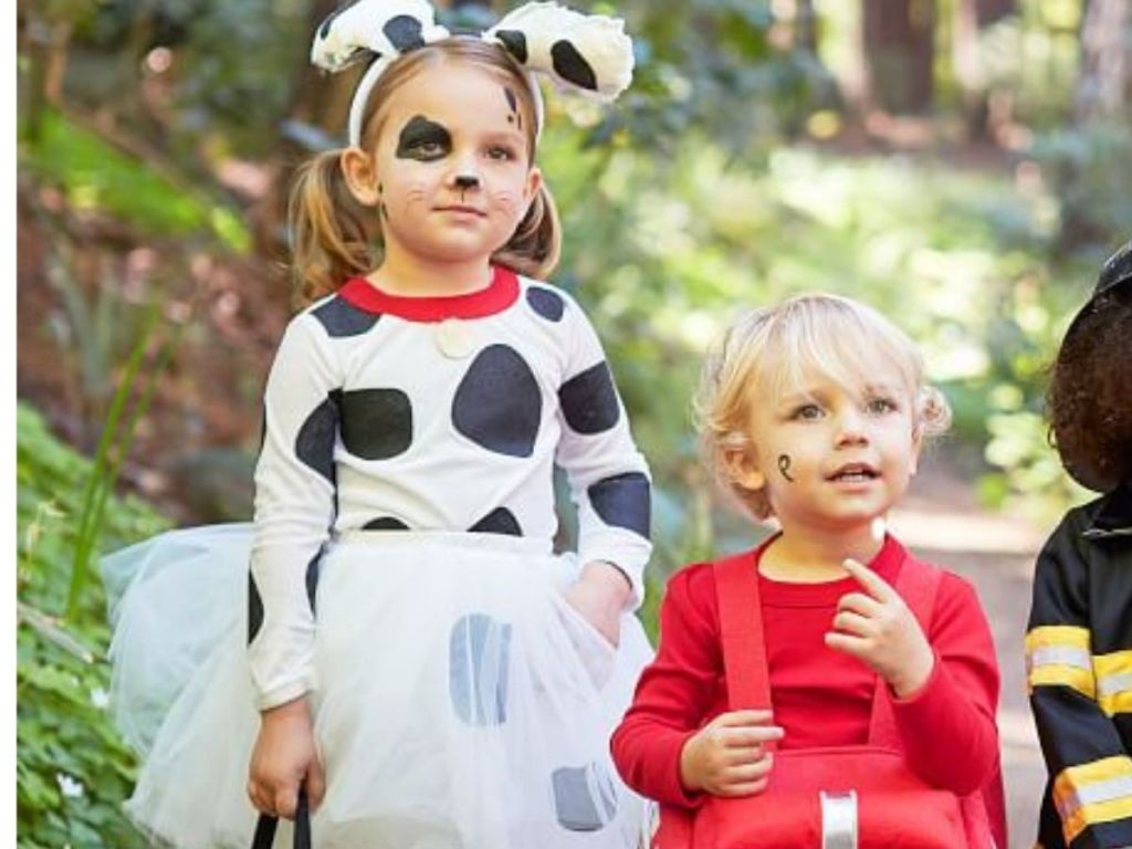 Little girl wearing Dalmation costume