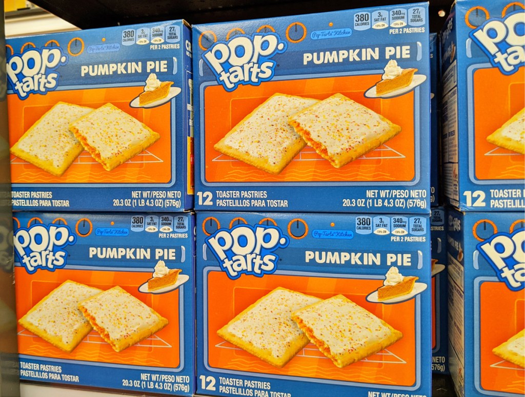 blue and orange boxes of pumpkin pie flavored pop-tarts on store display shelf