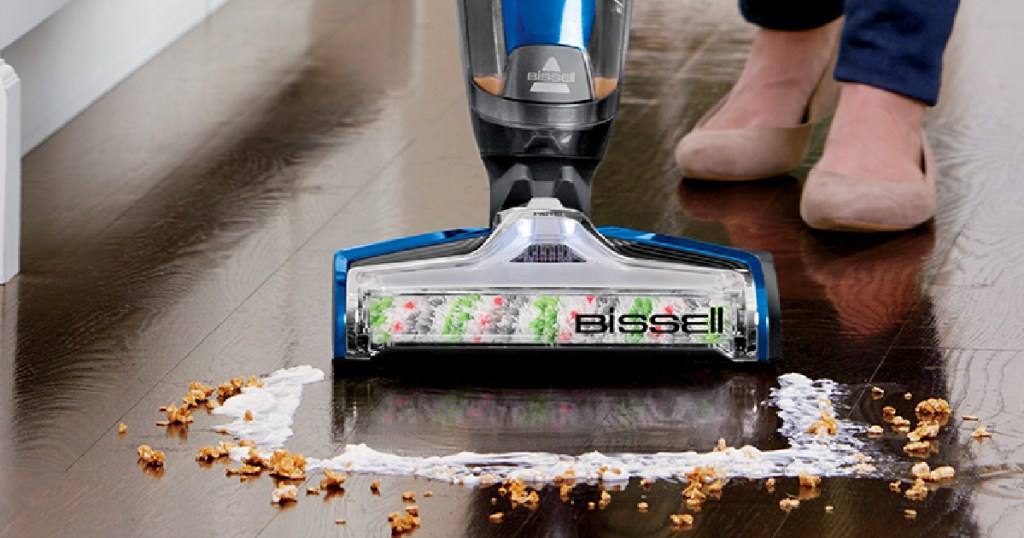 vacuum cleaner on hard floor cleaning up wet cereal