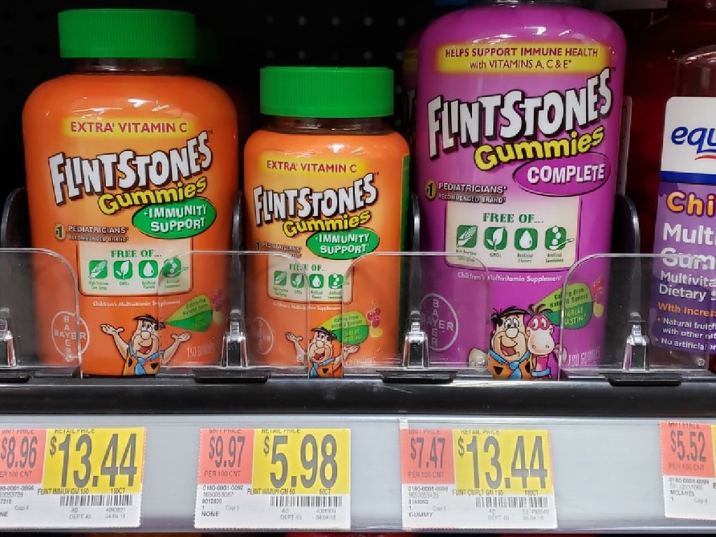 store shelf with bottles of vitamins lined up