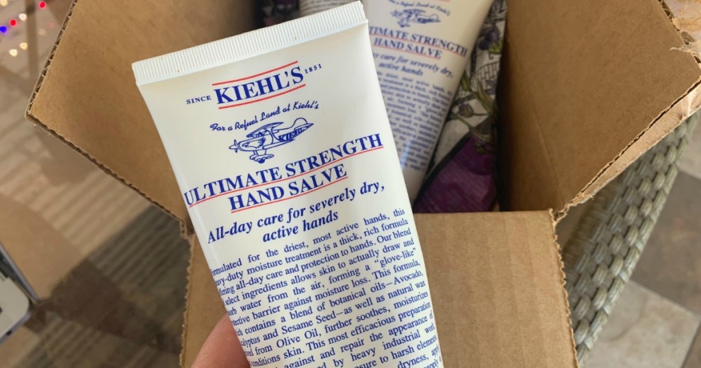 holding Kiehl's hand salve 