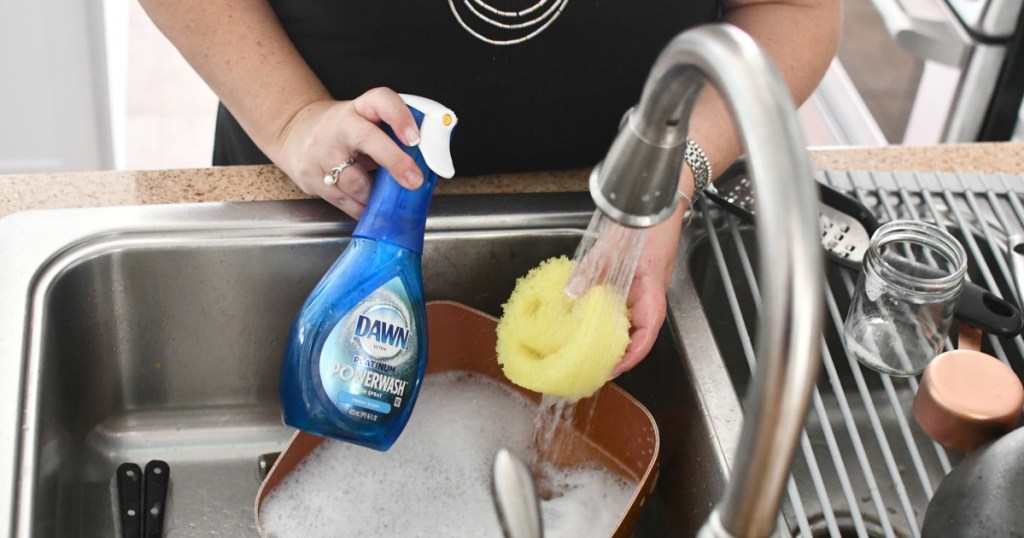 washing dishes with Dawn Powerwash dish spray