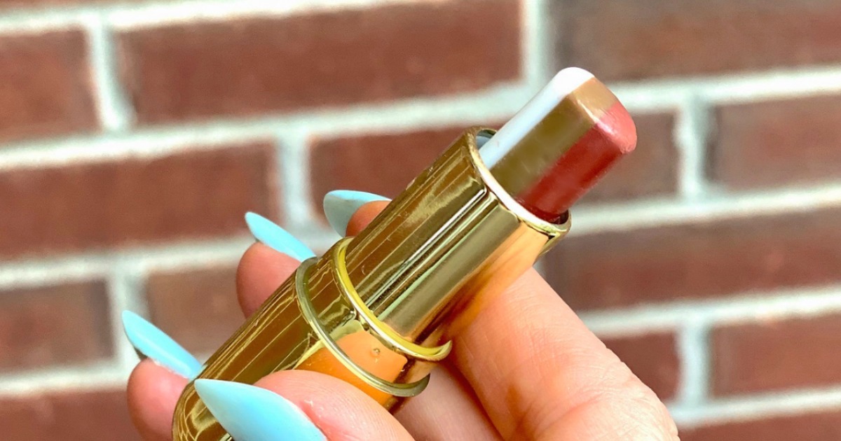 holding winky lux lip balm 