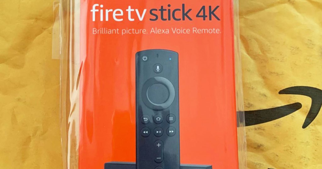 amazon fire tv stick 4k on a yellow amazon bubble mailer