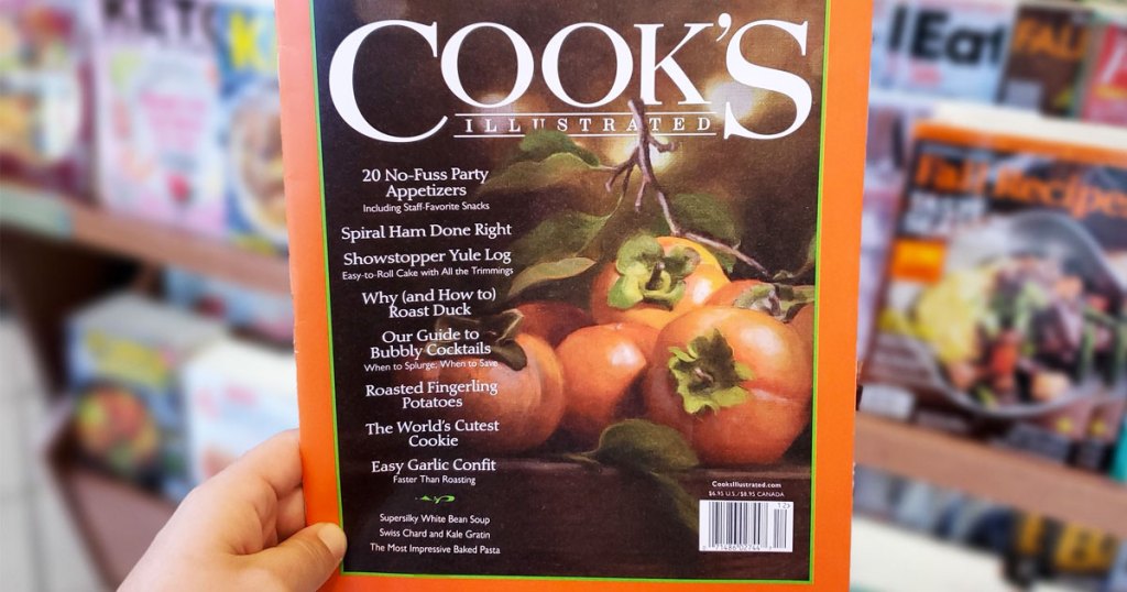 person holding up fall copy of Cook's Illustrated magazine