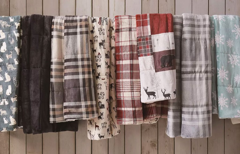 cuddl duds plush throw blankets hanging on line