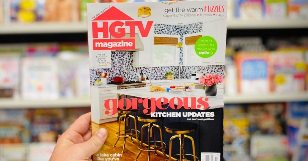 hand holding an HGTV magazine