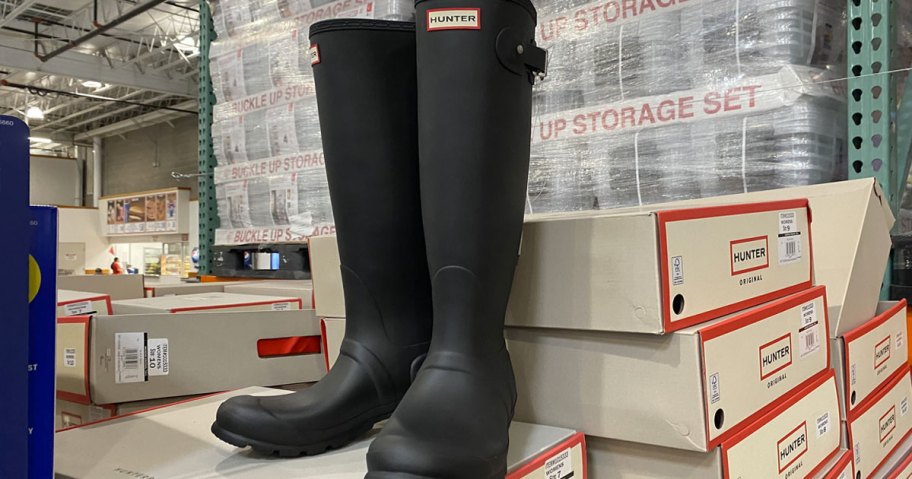 pair of matte black hunter rain boots on display at costco