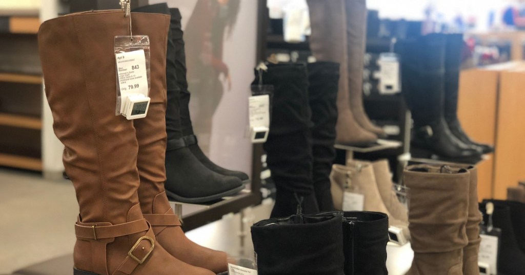 bootts stacked on table in store