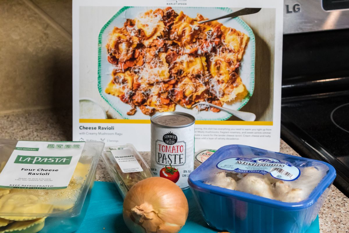 meal ingredients next to a ravioli a recipe