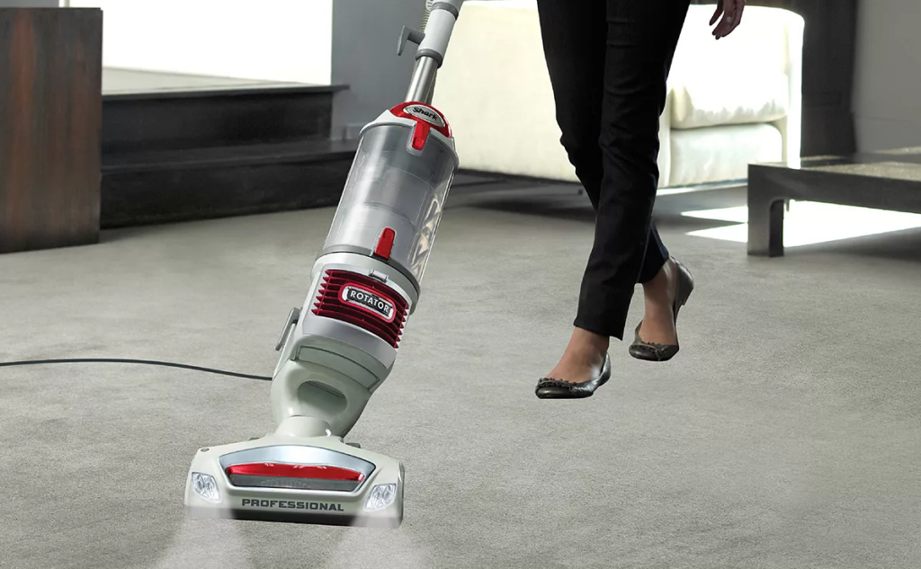 person vacuuming