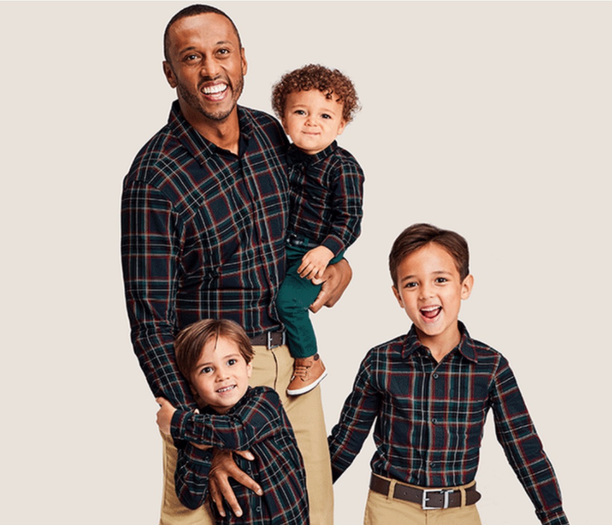 Dad and sons wearing matching shirts