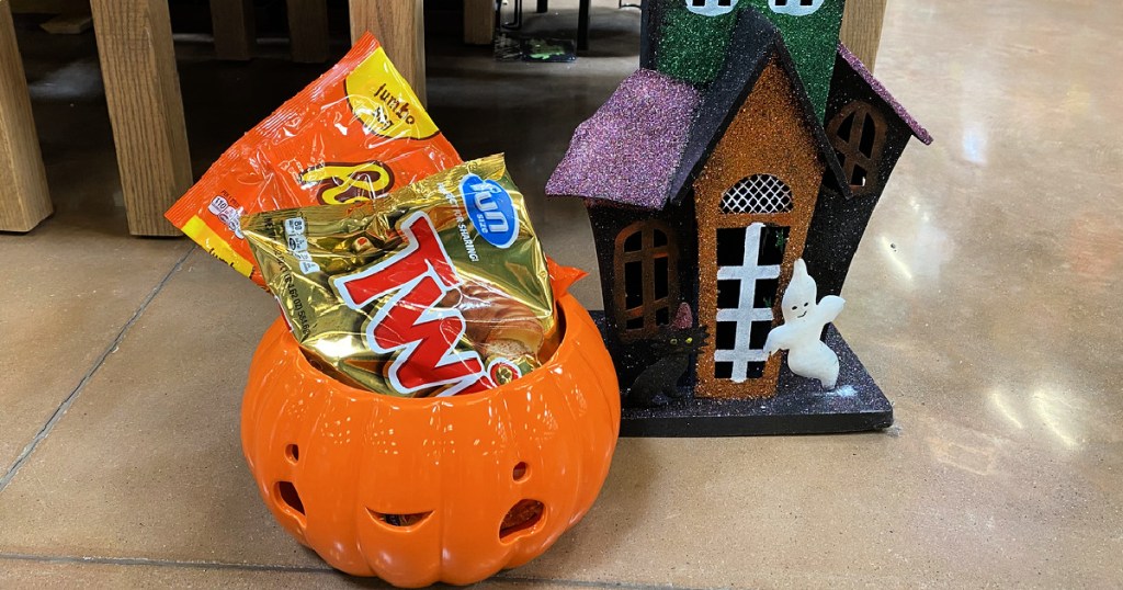 bagged candy in a glass pumpkin