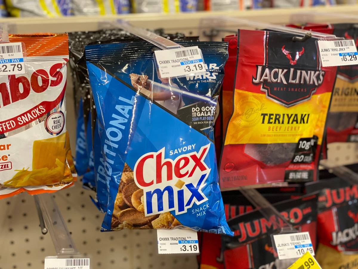 store display with bags of snacks hanging