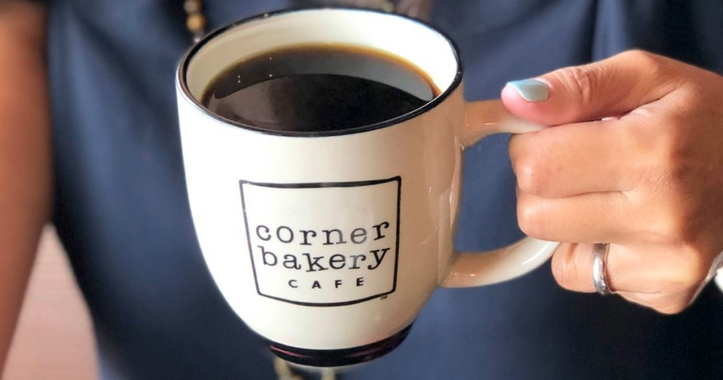 person holding hot cup of coffee