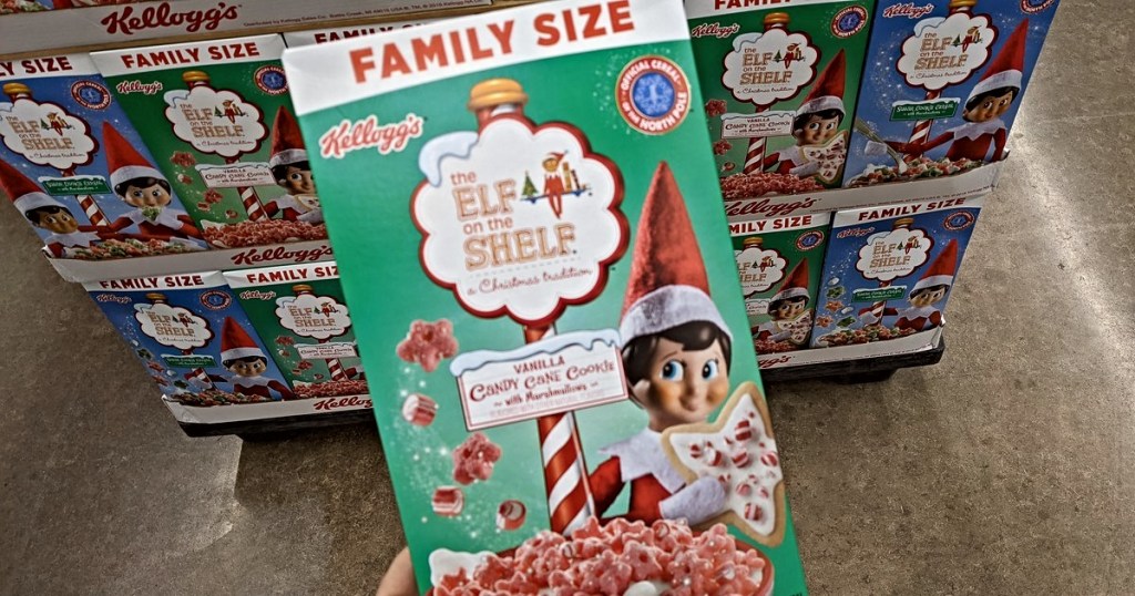 holding Elf on the Shelf Peppermint cereal