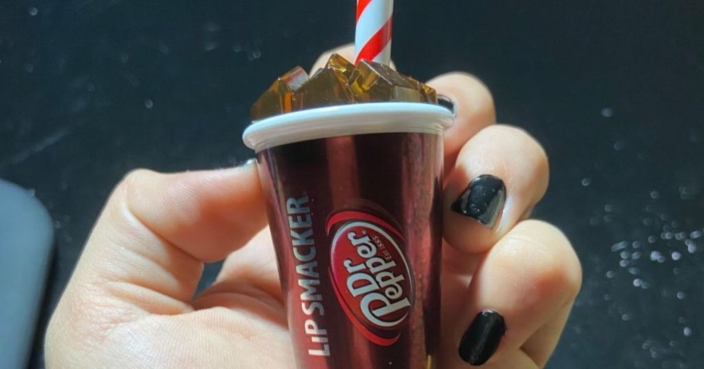 hand holding lip smackers dr pepper lip balm