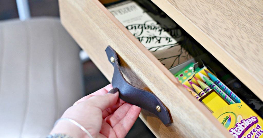 opening a drawer with leather drawer handles