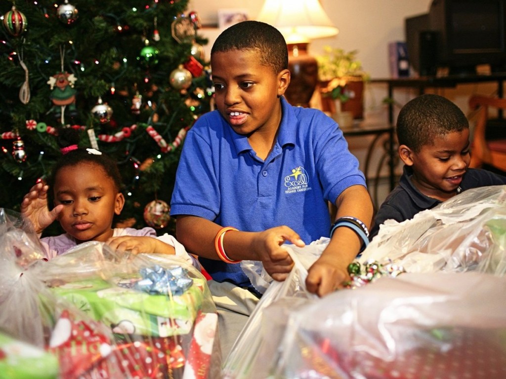 kids opening Christmas presents