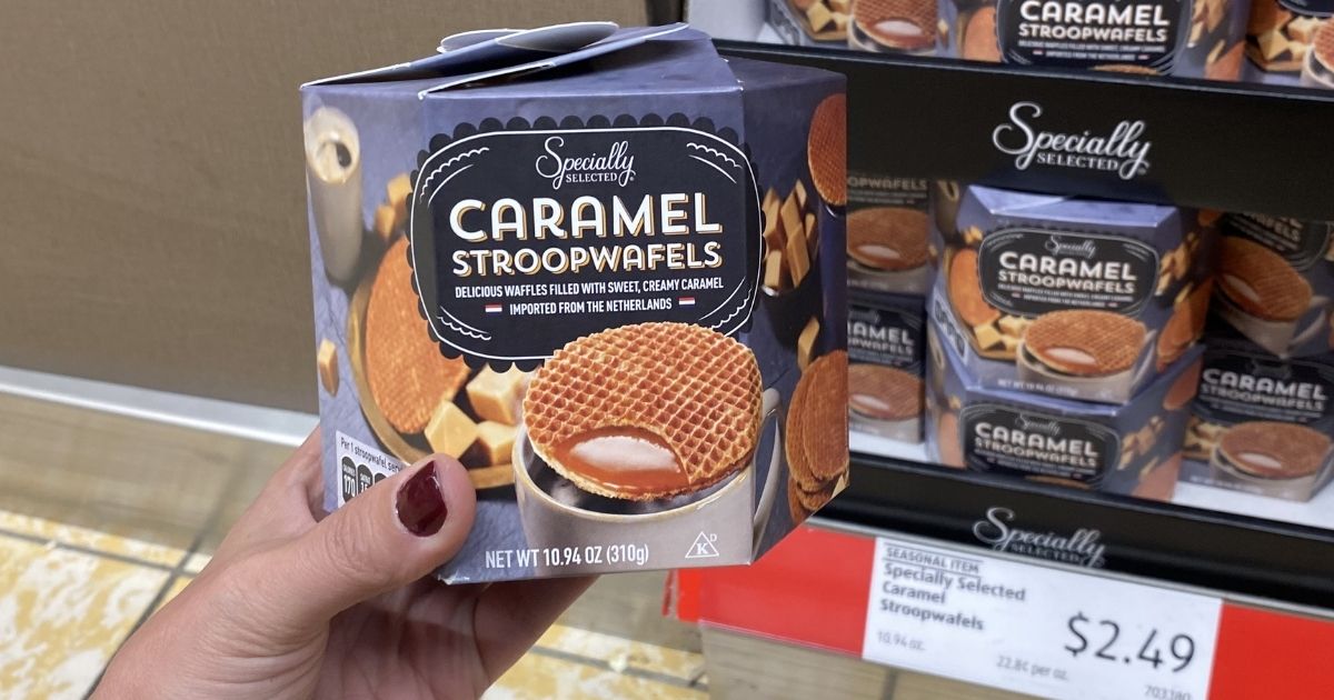 hand holding a box of Stroopwafels