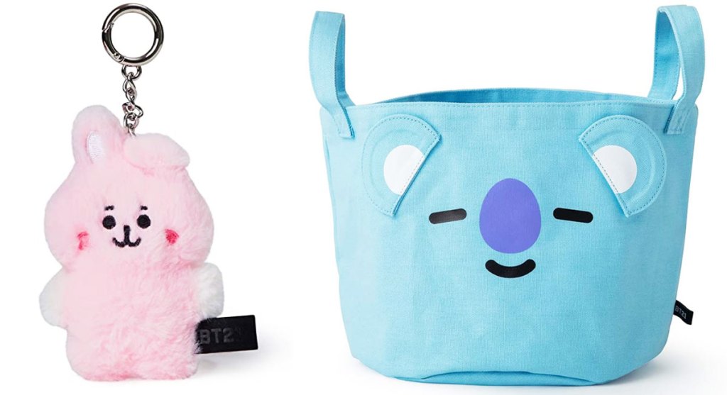 small pink plush character keychain and a blue fabric storage basket with a bear character's face